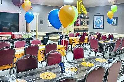 Birthday party room set up with balloons